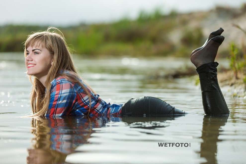 Wetlook By Pretty Girl In Fully Soaked Shirt And Black Jeans On Lake