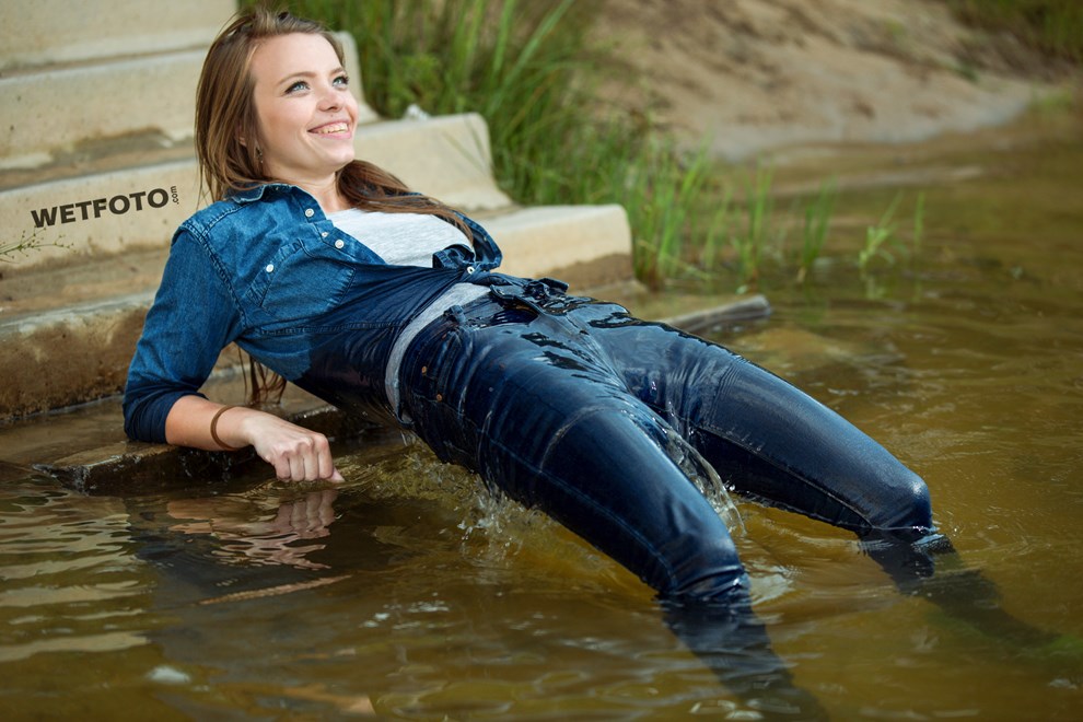 Wetlook By Smiling Girl In Wet Tight Jeans And Gray T Shirt Without Bra In The Lake
