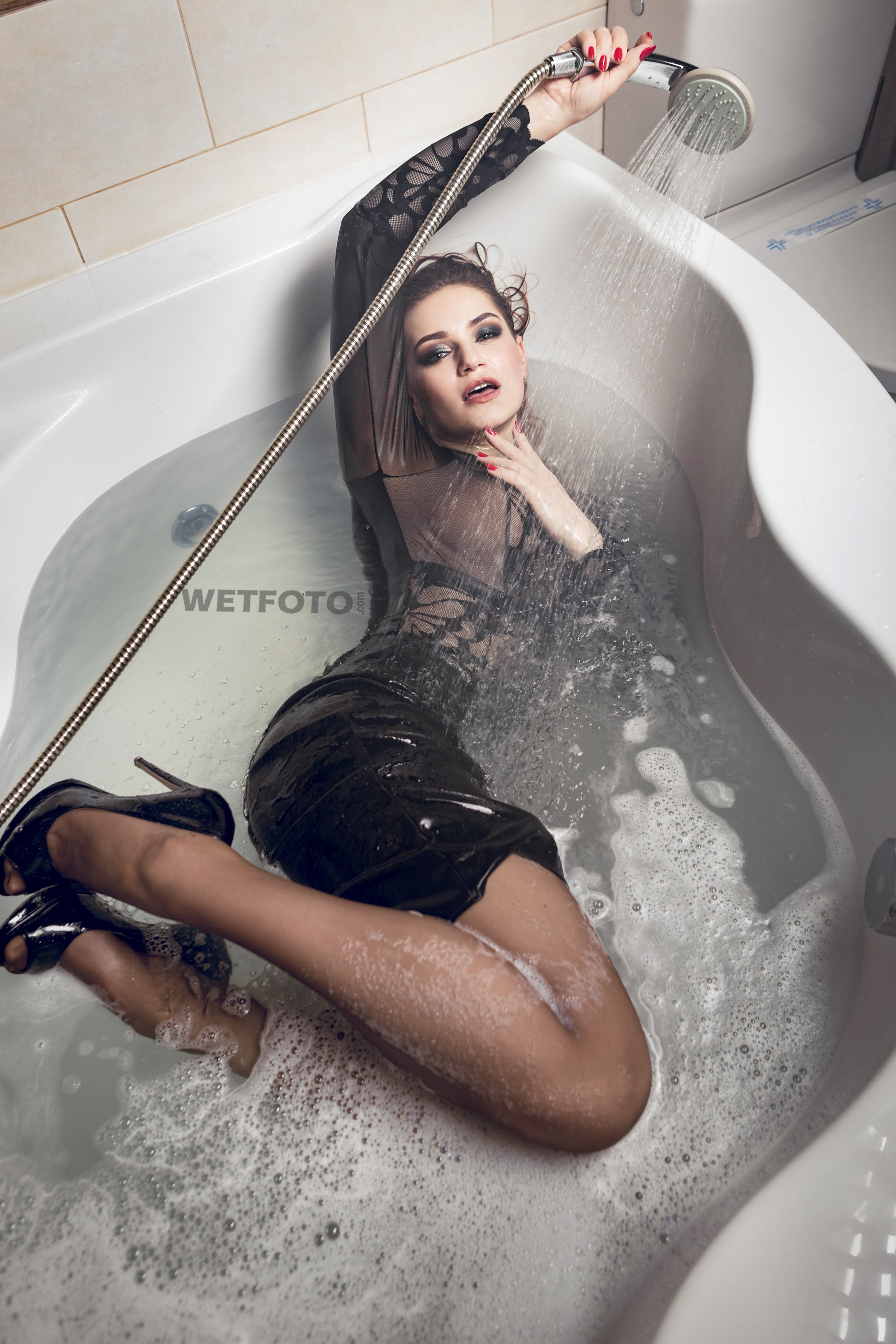 Let me introduce you our... http://wetlook.one/wetlook/fully-clothed-wetloo...
