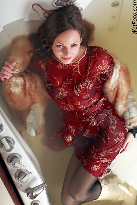wet girl get wet wet hair fully clothed fur coat dress tights leather boots jacuzzi