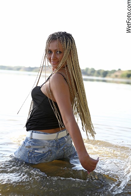 wet girl get wet wet hair swim fully clothed top jeans high heels shoes lake