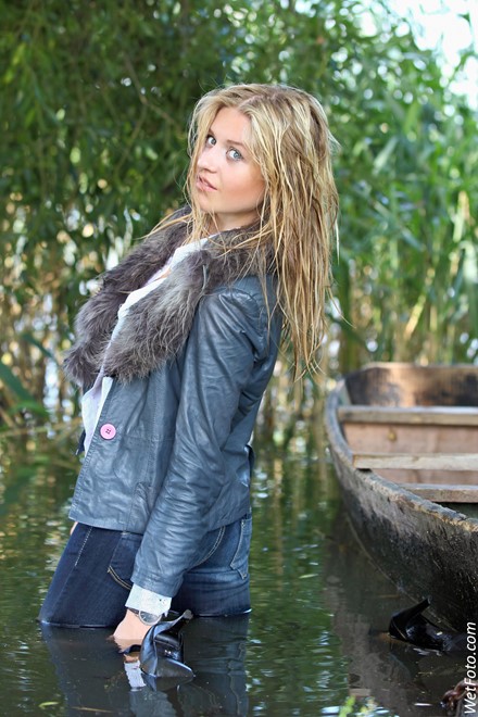 wet girl get wet wet hair swim fully clothed leather jacket fur jeans shirt high heels shoes lake