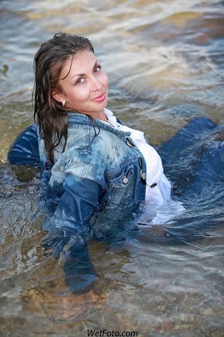 wet girl get wet wet hair swim fully clothed tight jeans jacket denim high heel sandals sea