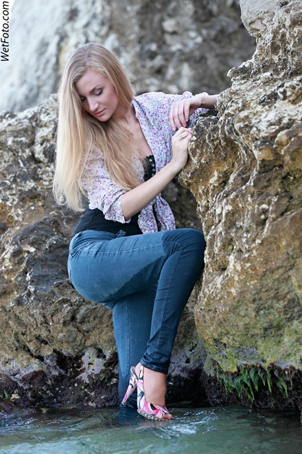wet girl get wet wet hair fully clothed tight jeans shirt t-shirt high heels sea