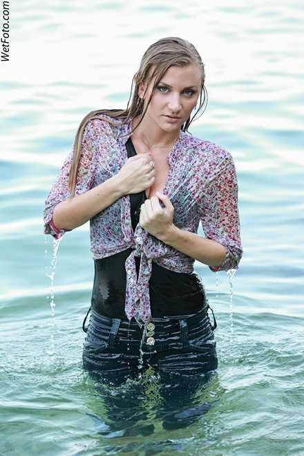 wet girl get wet wet hair fully clothed tight jeans shirt t-shirt high heels sea