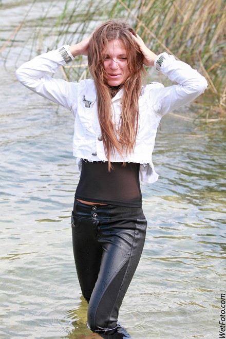 wet girl get wet wet hair soaking wet jacket golf leather pants high heels lake