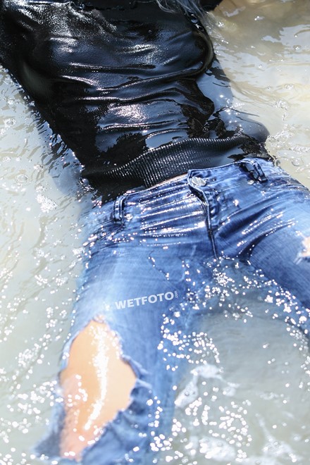 wet girl get wet tight jeans sweater shirt boots swim fully clothed wet hair