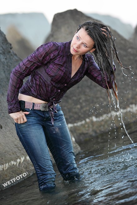 wet girl get wet swim fully clothed wet hair jacket shirt jeans sea