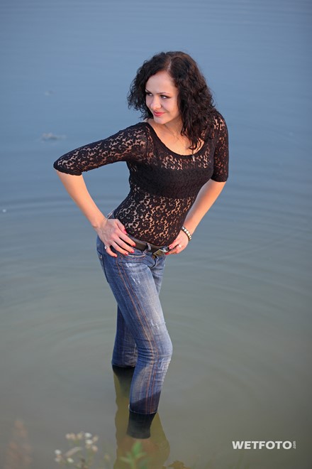 wet girl get wet fully clothed jeans blouse shoes high heels lake