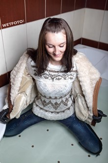 #255 - Wetlook by Brunette Girl in Wet Jacket, Tight Jeans and Sweater in Jacuzzi