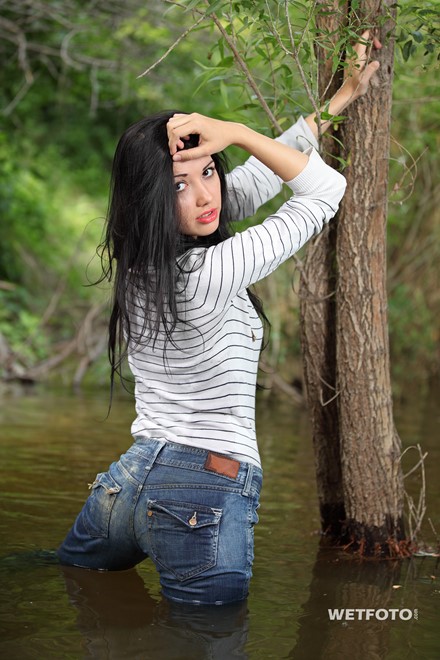 wet girl brunette wet hair get wet swimming fully clothed tight jeans sweater tights shoes high heels river