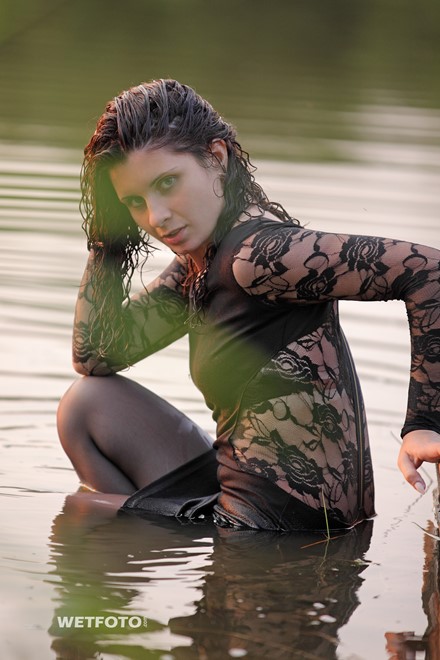wet girl brunette wet hair get wet swimming fully clothed tight dress stockings heels lake