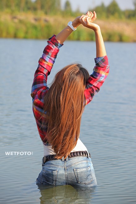 wet girl get wet wet hair swim fully clothed jeans shirt sneakers lake
