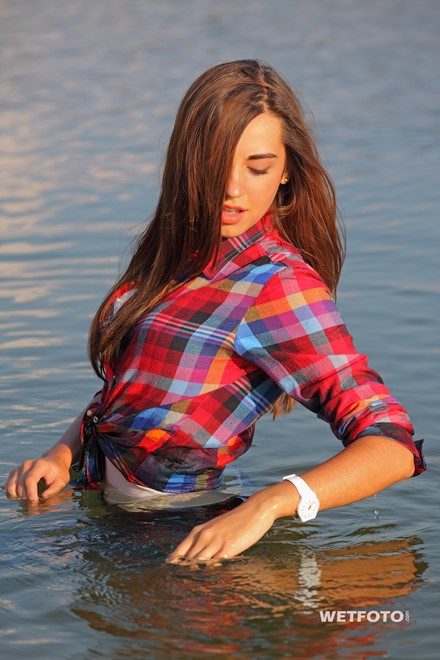 wet girl get wet wet hair swim fully clothed jeans shirt sneakers lake
