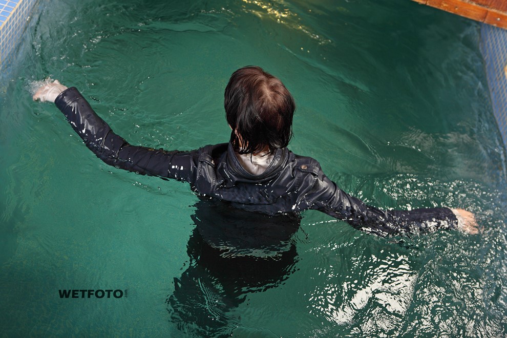 wet girl get wet wet hair leather jacket leggings high heels pool