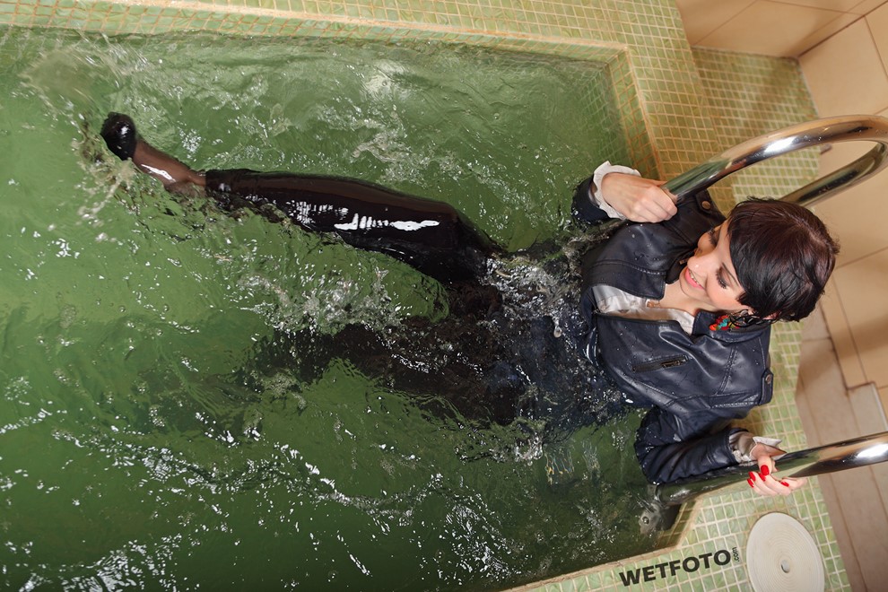 wet girl get wet wet hair leather jacket leggings high heels pool