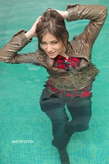 #293 - Beautiful Girl in Leather Jacket, Tight Jeans and Boots in Pool