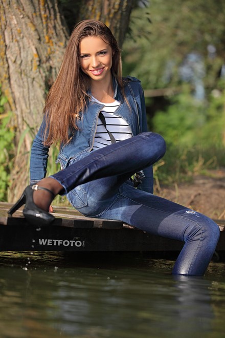 wet girl wet hair get wet t-shirt jacket denim jeans tights high heels swim fully clothed lake