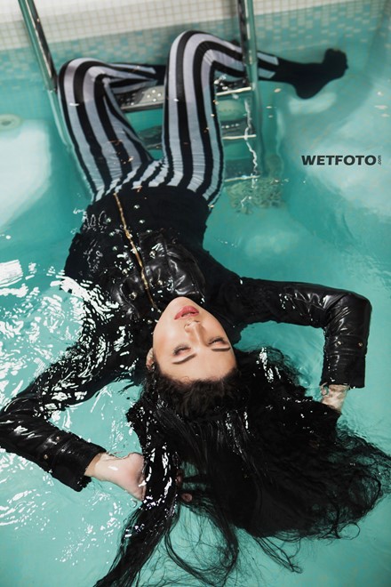 wet girl wet hair get wet top leather jacket leggings high heels fully soaked swim fully clothed pool
