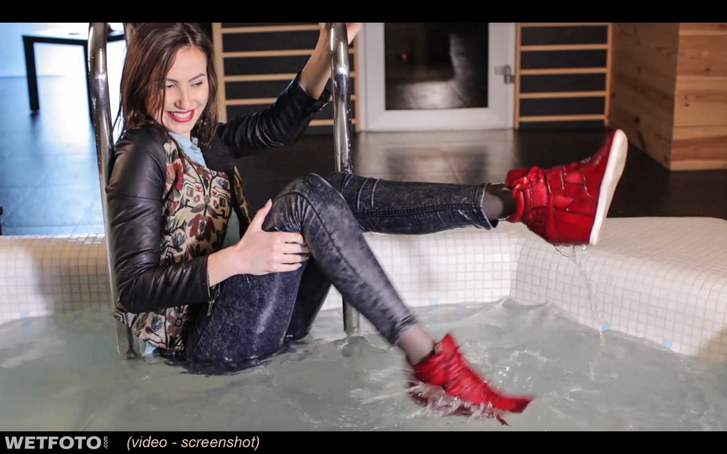 wet girl wet hair get wet top leather jacket tight jeans sneakers fully soaked spa