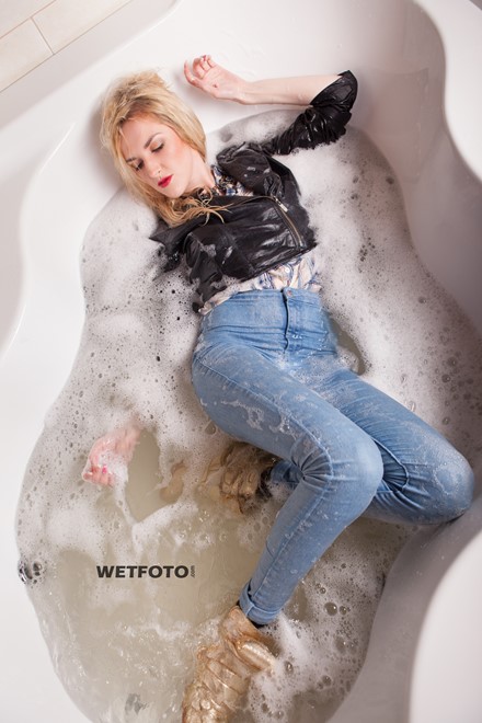 wet girl wet hair get wet leather jacket shirt high-waisted jeans skinny tights sneakers soaking wet jacuzzi