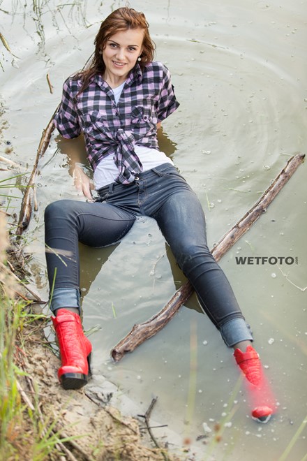 wet girl wet hair get wet checkered shirt t-shirt tight jeans boots high heels lake