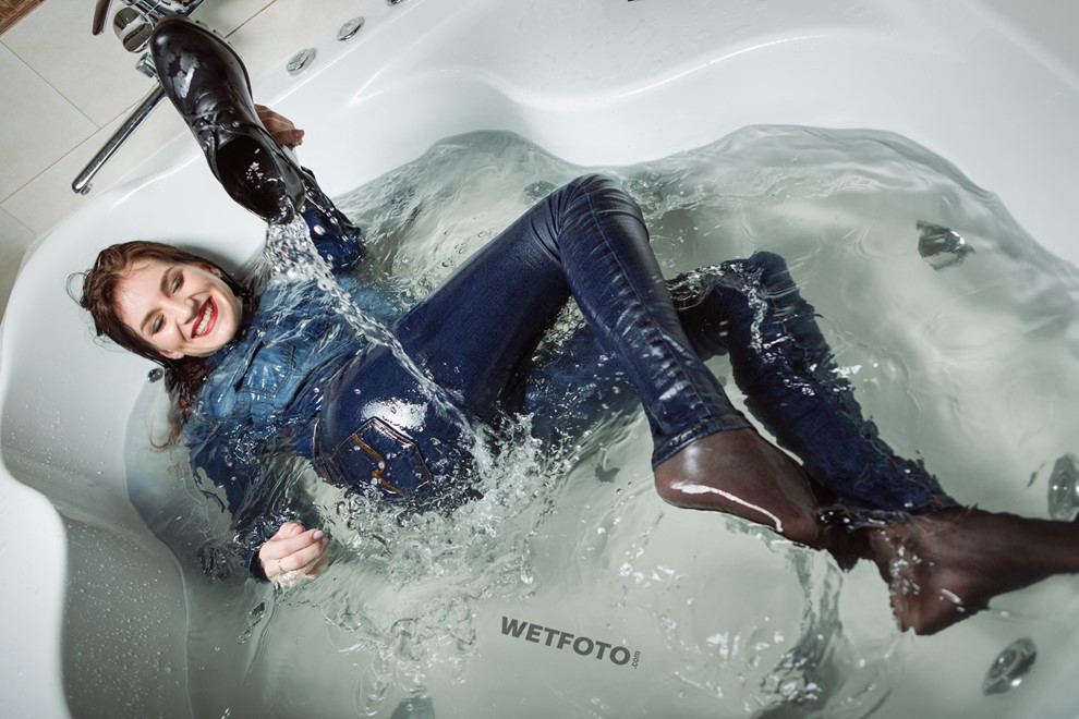 wet girl fully clothed get wet soaking wet denim shirt leather jacket jeans boots jacuzzi
