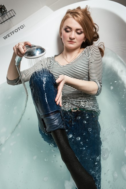 wet girl fully clothed get wet soaking wet striped sweater tight jeans boots high heels bath