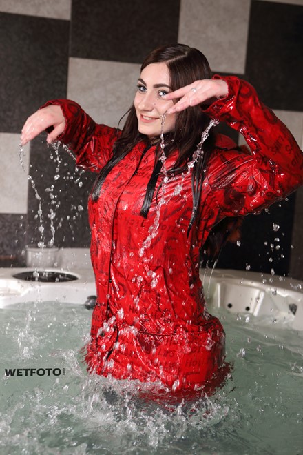 wet girl fully clothed get wet soaking wet blouse anorak tight jeans tights jacuzzi