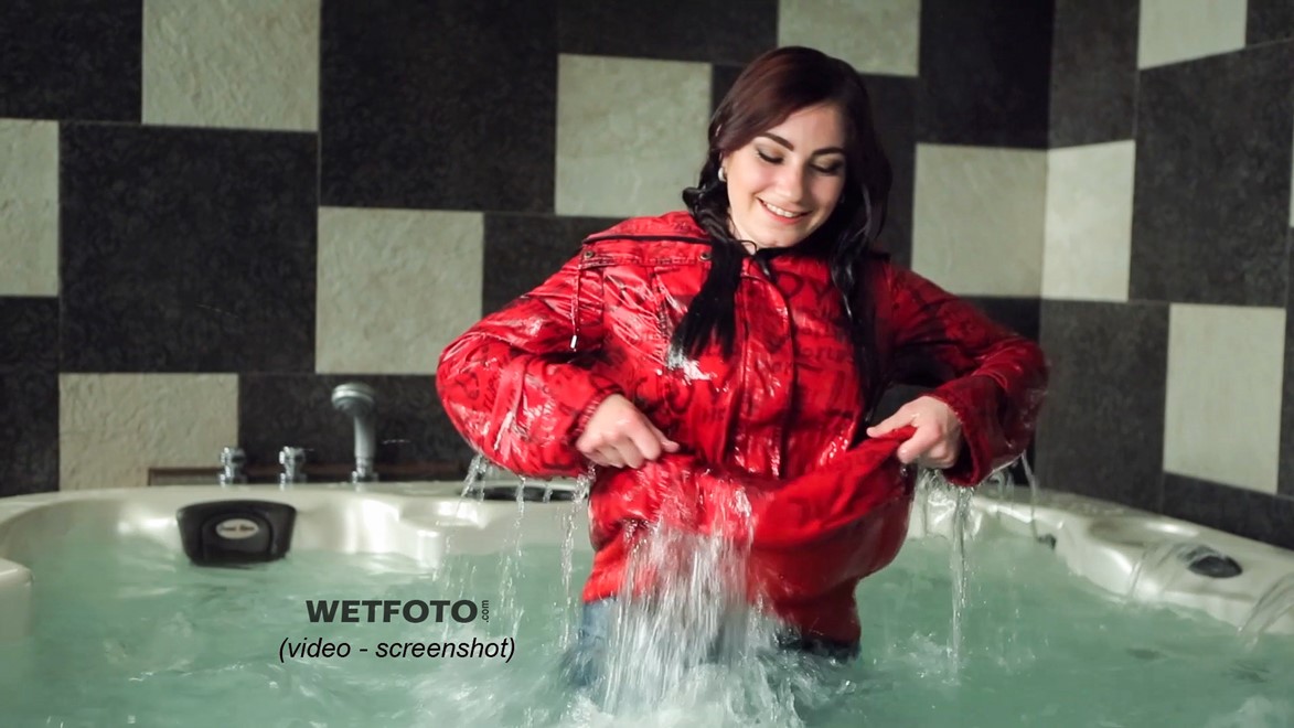 wet girl fully clothed get wet soaking wet blouse anorak tight jeans tights jacuzzi