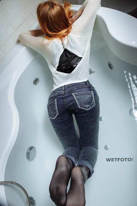 wet girl wet hair get wet fully clothed sweater shirt tights tight jeans high heels jacuzzi shower