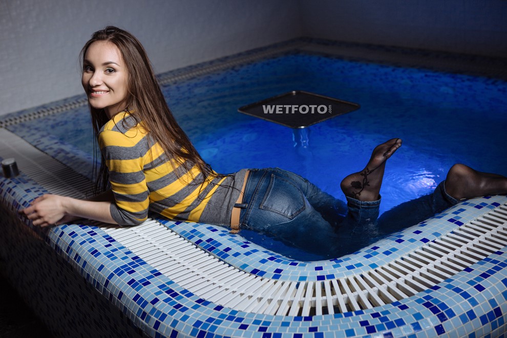 wet girl get wet swimming fully clothed tights sweater tight jeans high heels pool shower