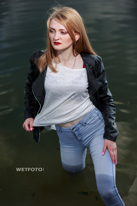 wet girl wet hair get wet swimming fully clothed tights leather jacket skinny jeans lake