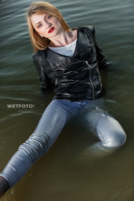 wet girl wet hair get wet swimming fully clothed tights leather jacket skinny jeans lake