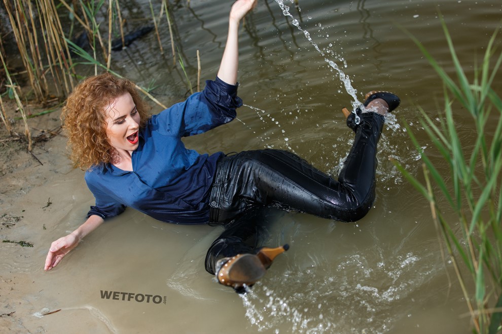 wet girl wet hair get wet swimming fully clothed shirt leather pants high heels lake