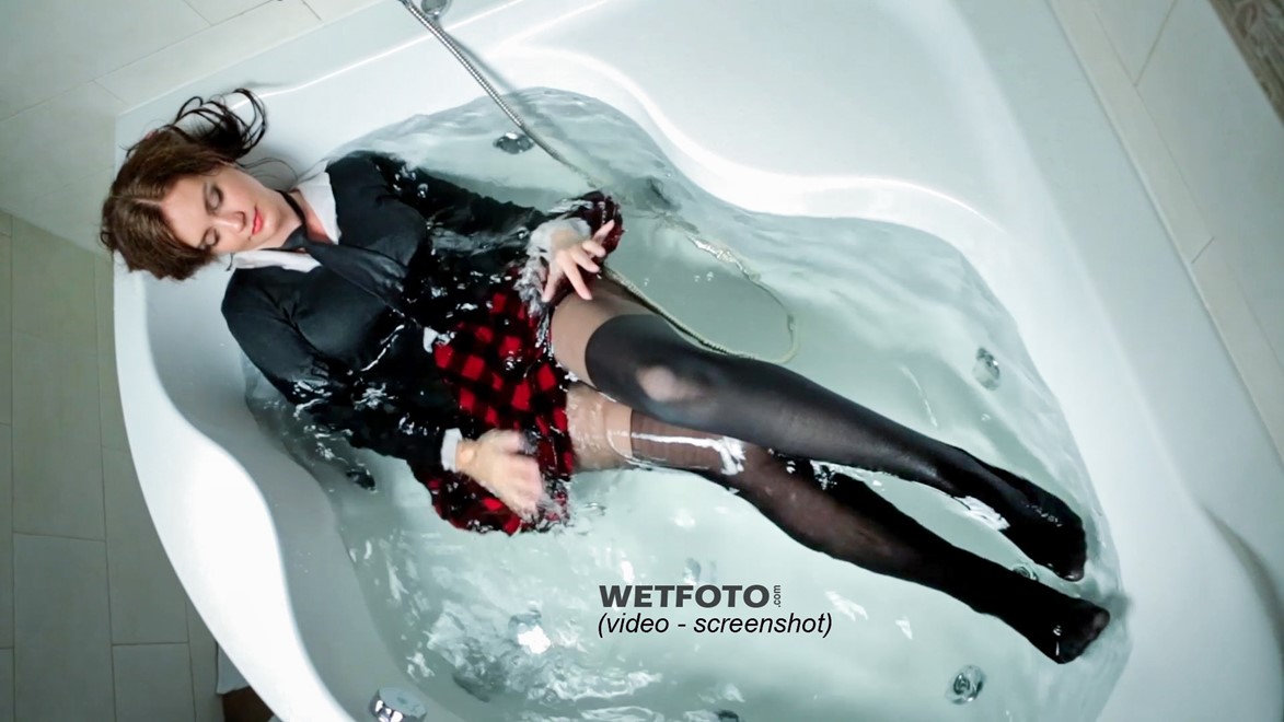 wet girl wet hair get wet fully clothed outfit jacket shirt skirt stockings shoes high heels bath shower