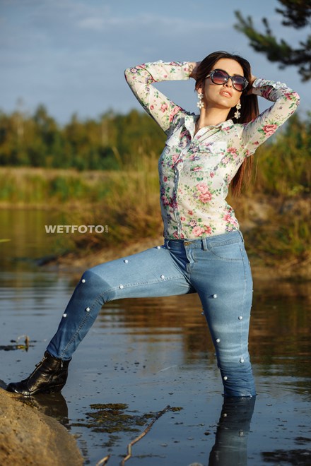 wet girl woman wet hair get wet soaked swimming jeans t-shirt boots high heels lake