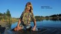 woman fully clothed wet hair shirt denim shorts stockings shoes high heels lake