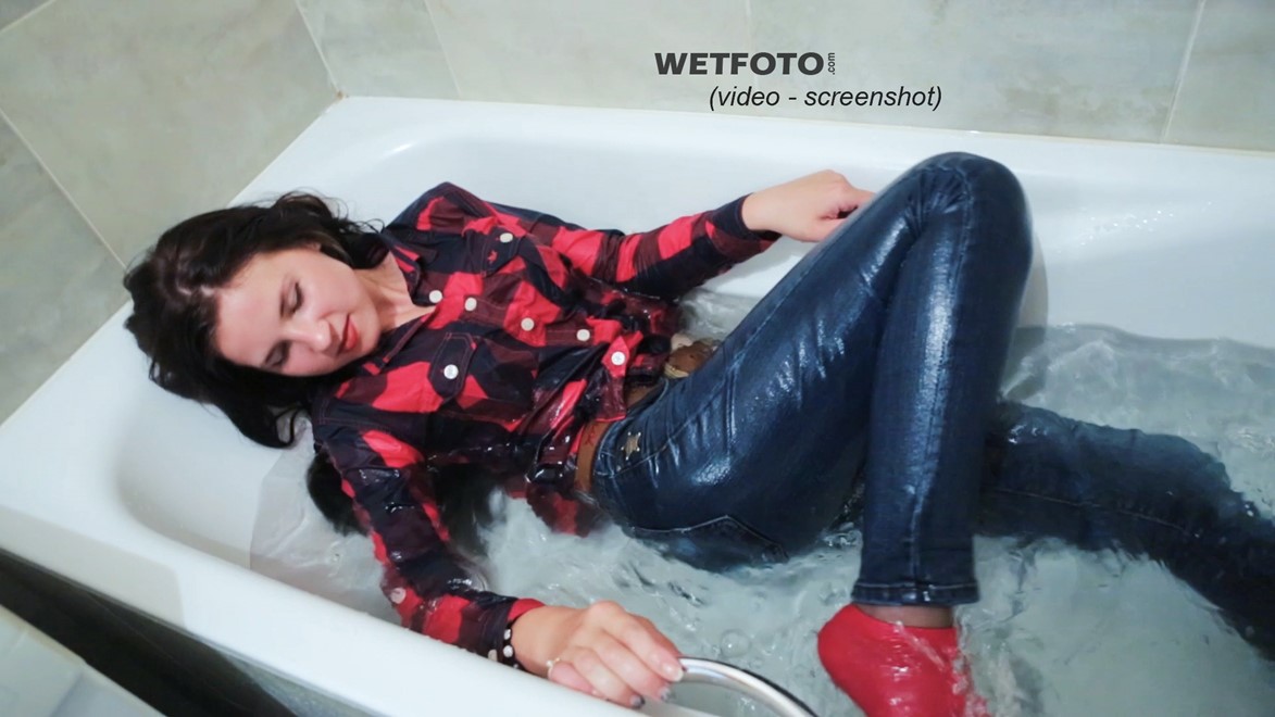 wet girl get wet soaking fully clothed jeans shirt socks wet hair bath