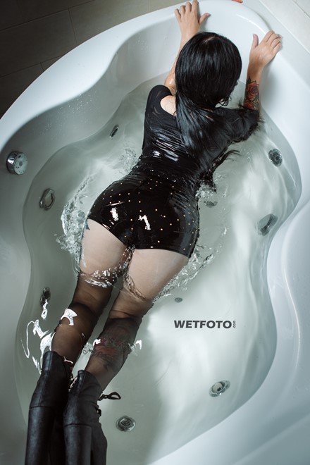 wetlook wet girl takes a bath shower clothes wearing wet black bodysuit tattoo jeans shorts nylons shoes wetfoto