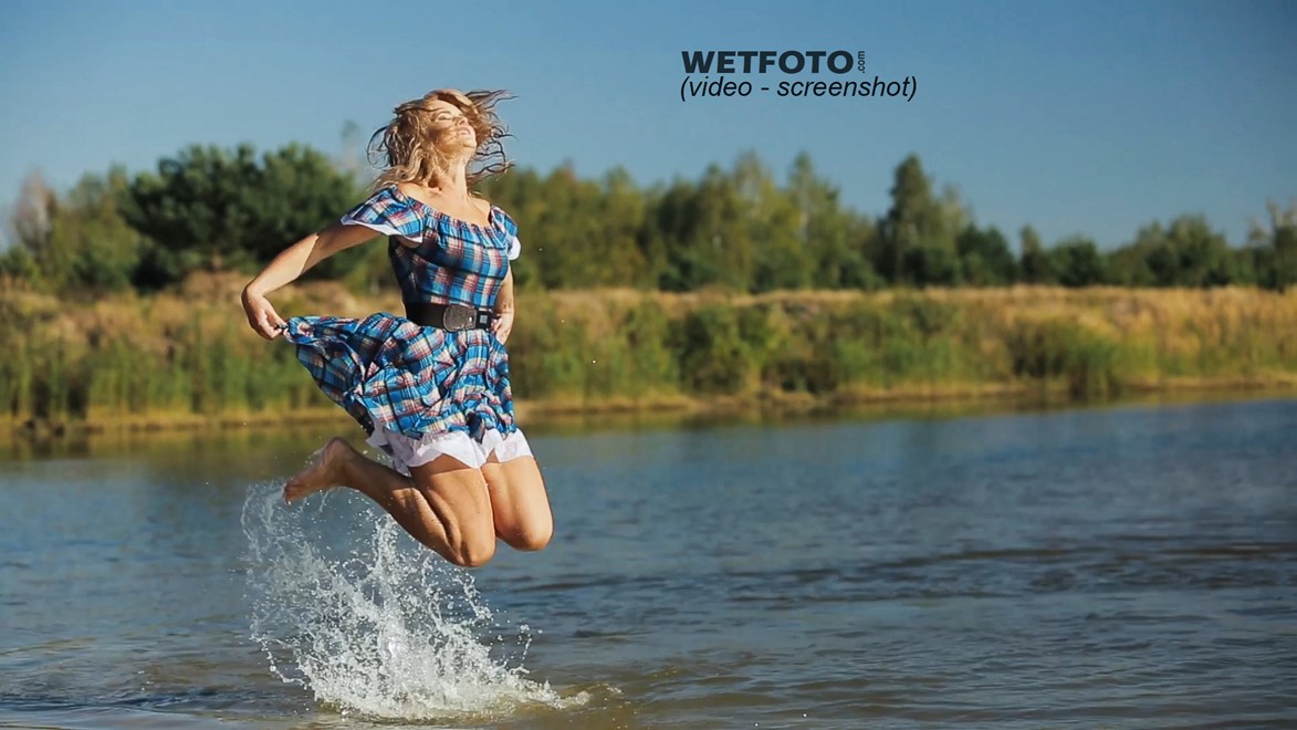 wet girl fully clothed dress shoes swim wet hair water lake