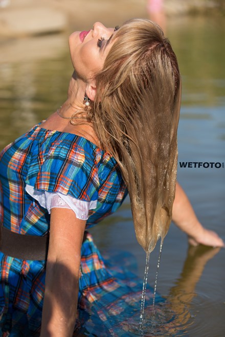 wetlook girl in wet dress