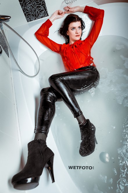 wetlook girl get wet fully clothed bathroom takes shower shiny faux leather pants