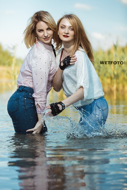 wet girl fully clothed blouse jacket jeans tights water lake
