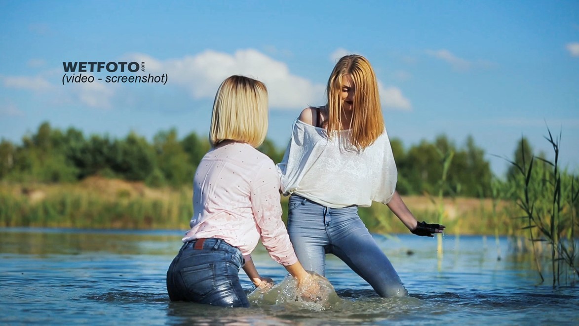 wet girl fully clothed blouse jacket jeans tights water lake