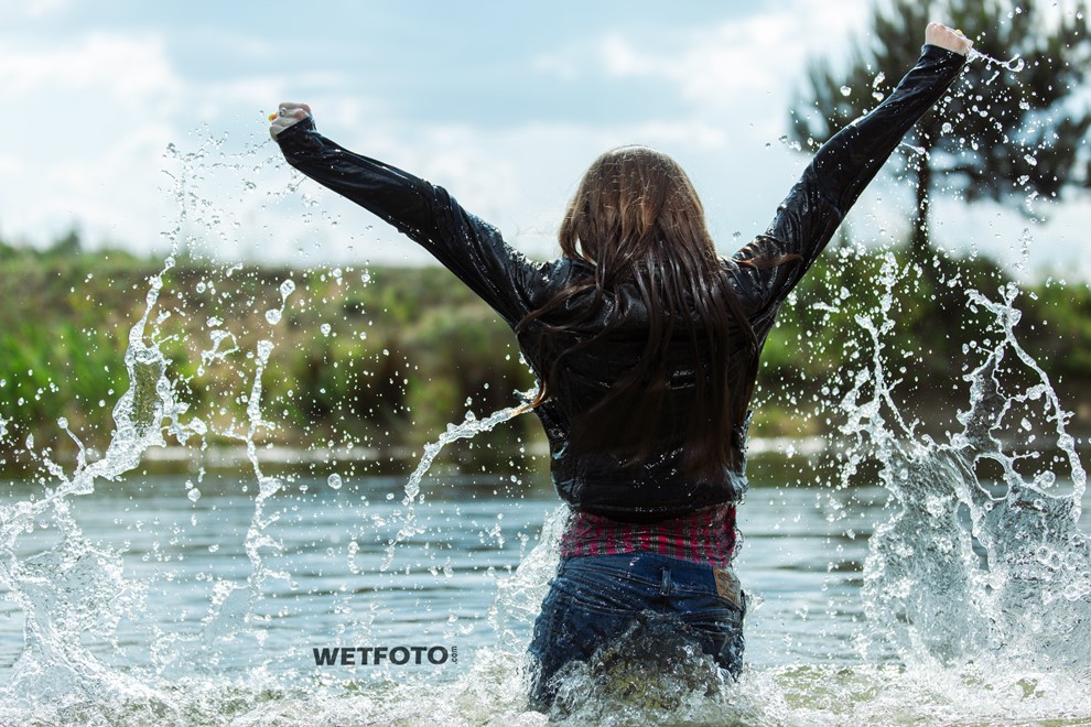wet girl get wet jacket jeans leather shirt shoes high heels tights fully clothed water swim lake