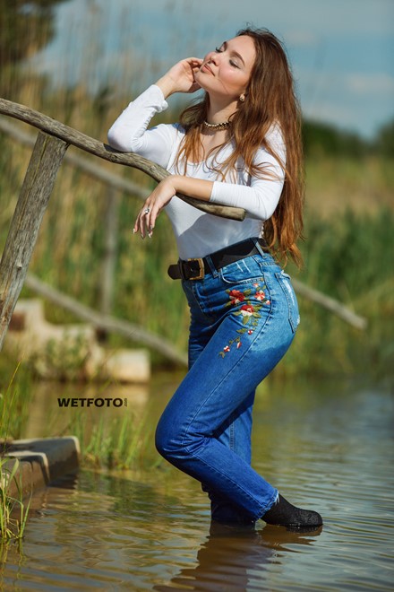 wet girl get wet blouse jeans socks jacket fully clothed wet hair swimming lake water