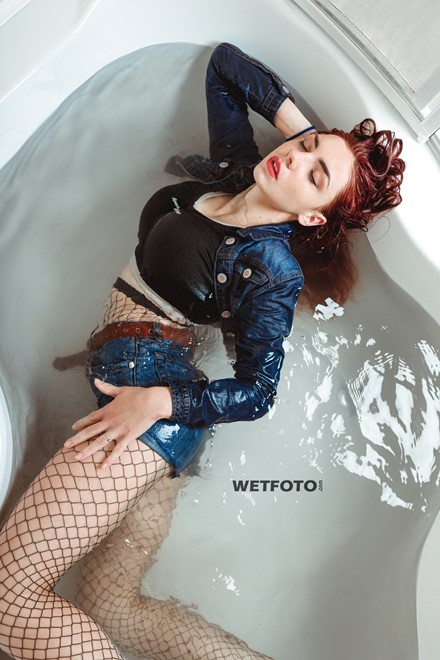 wet girl wet hair jeans jacket top high waisted shorts fishnet tights bath