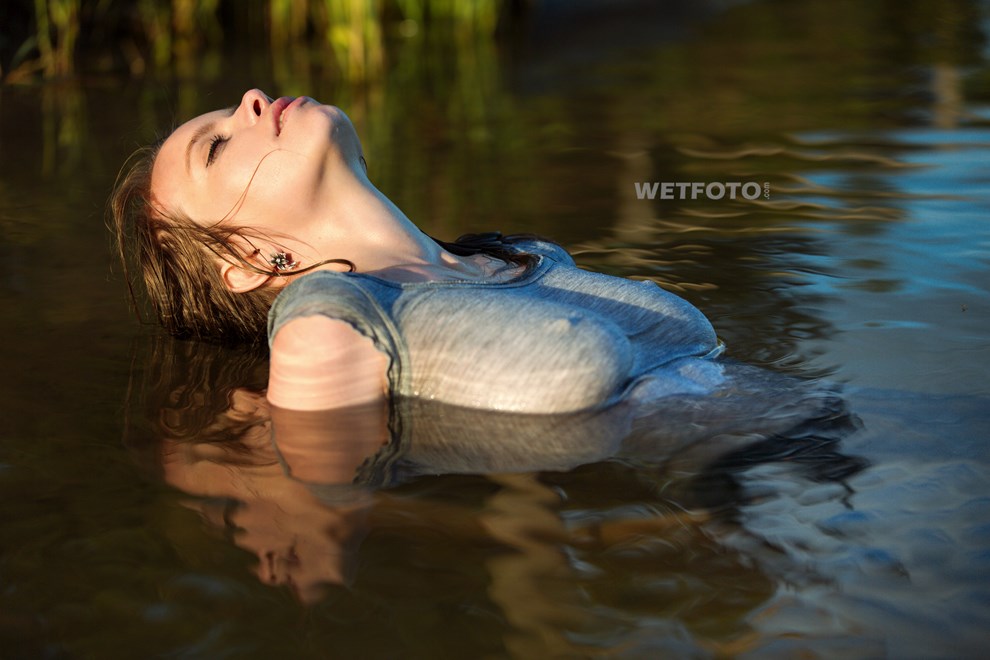 store wetfoto wetlook girl wet gray t shirt no bra swims fully clothed lake