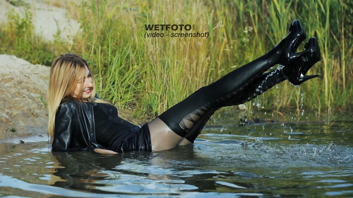 wet girl get wet faux leather jacket bodysuit jeans skirt tights gaiters shoes high heels wet hair lake